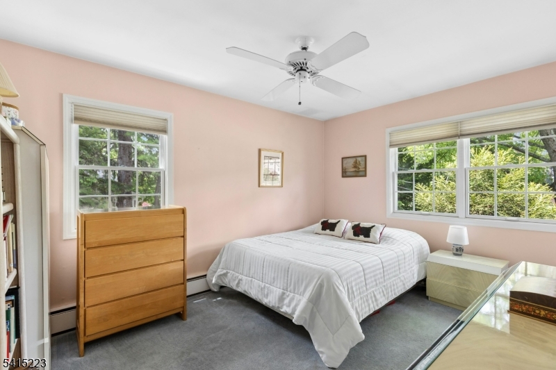 33 Carol Road Westfield, NJ 07090 - Photo 16 of 23 a bedroom with a bed and a window