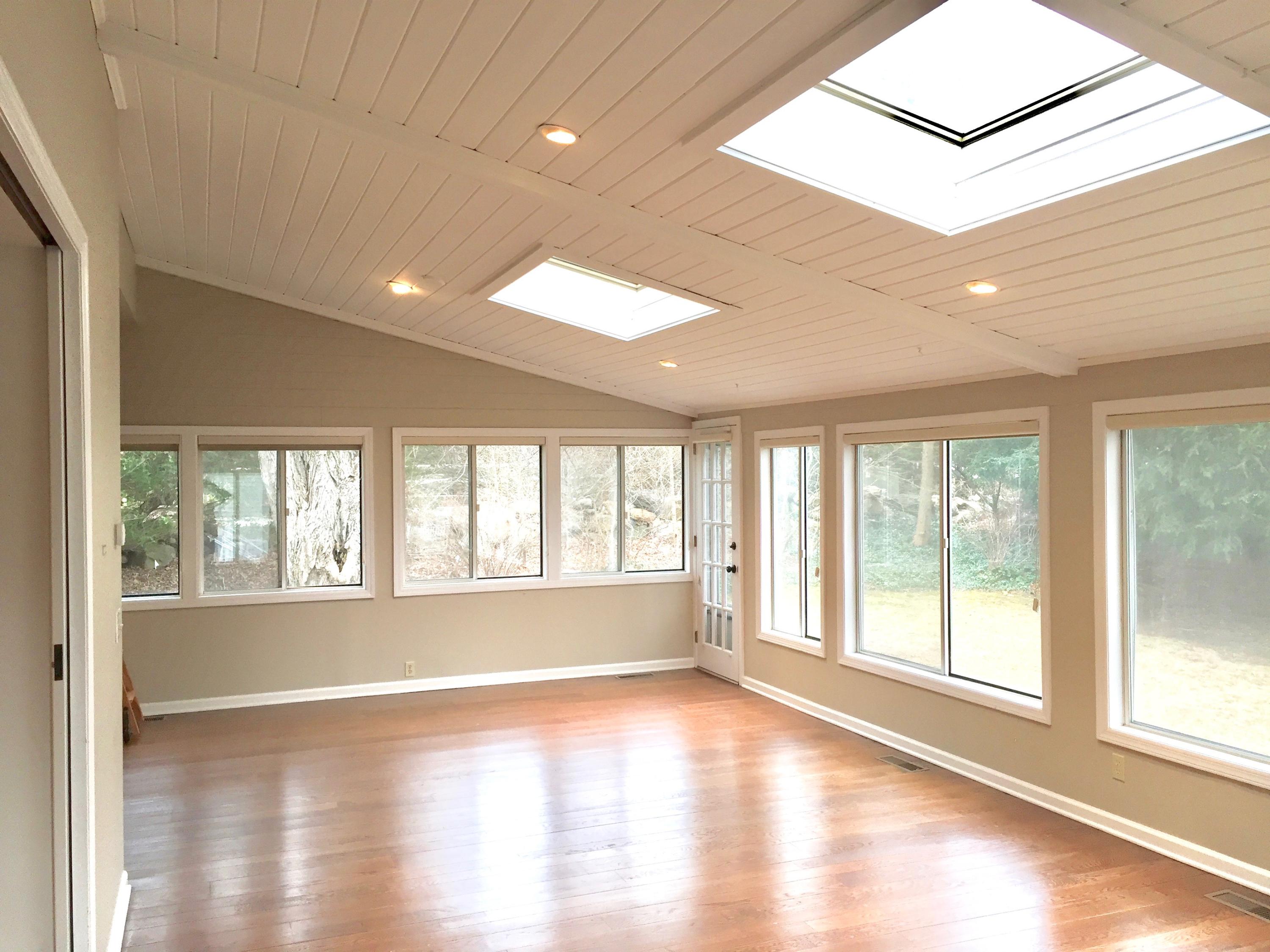 181 Middlesex Road Darien, CT 06820 - Photo 12 of 38 a view of an empty room with wooden floor and a window
