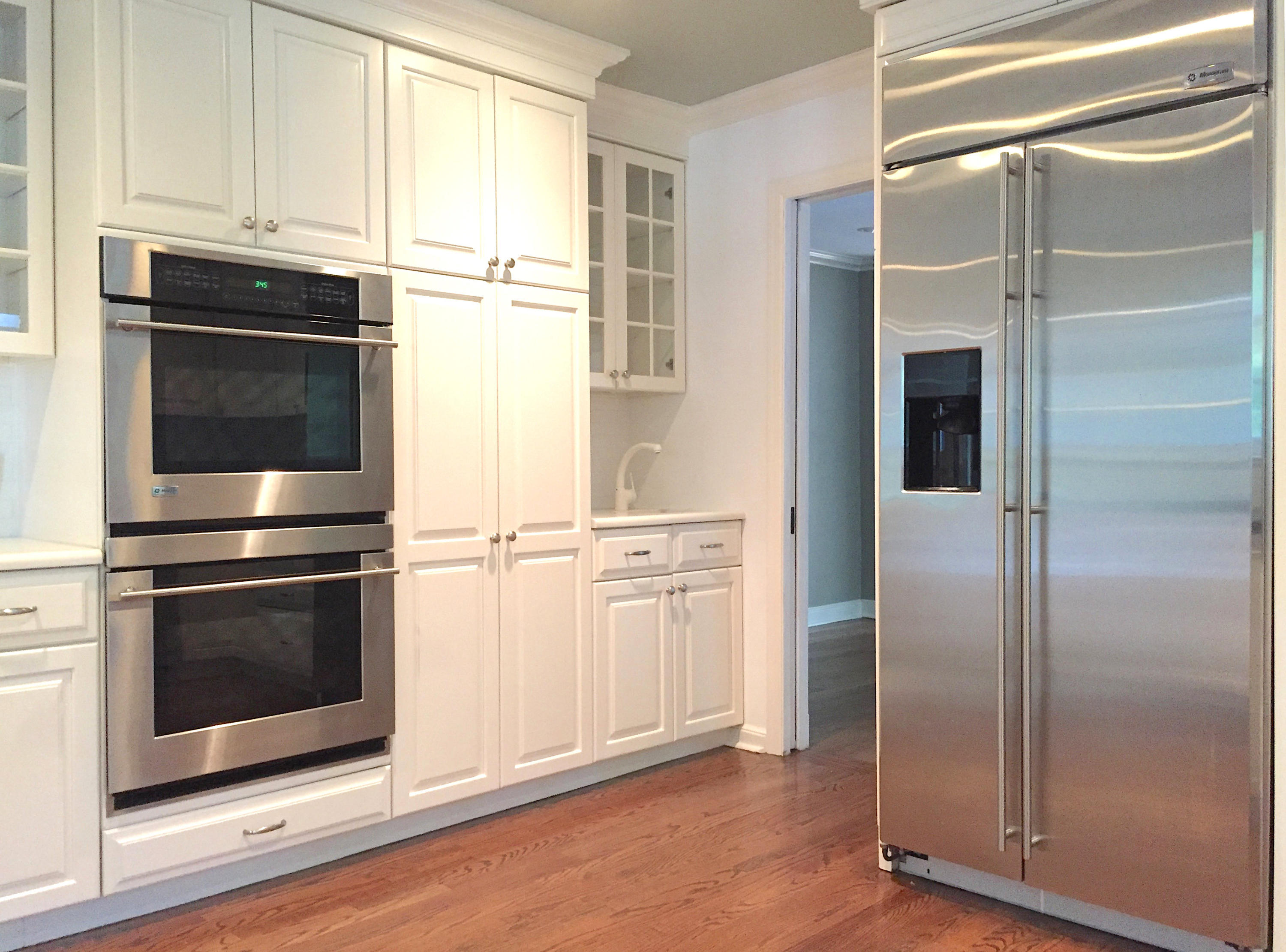 181 Middlesex Road Darien, CT 06820 - Photo 14 of 38 a kitchen with cabinets and stainless steel appliances
