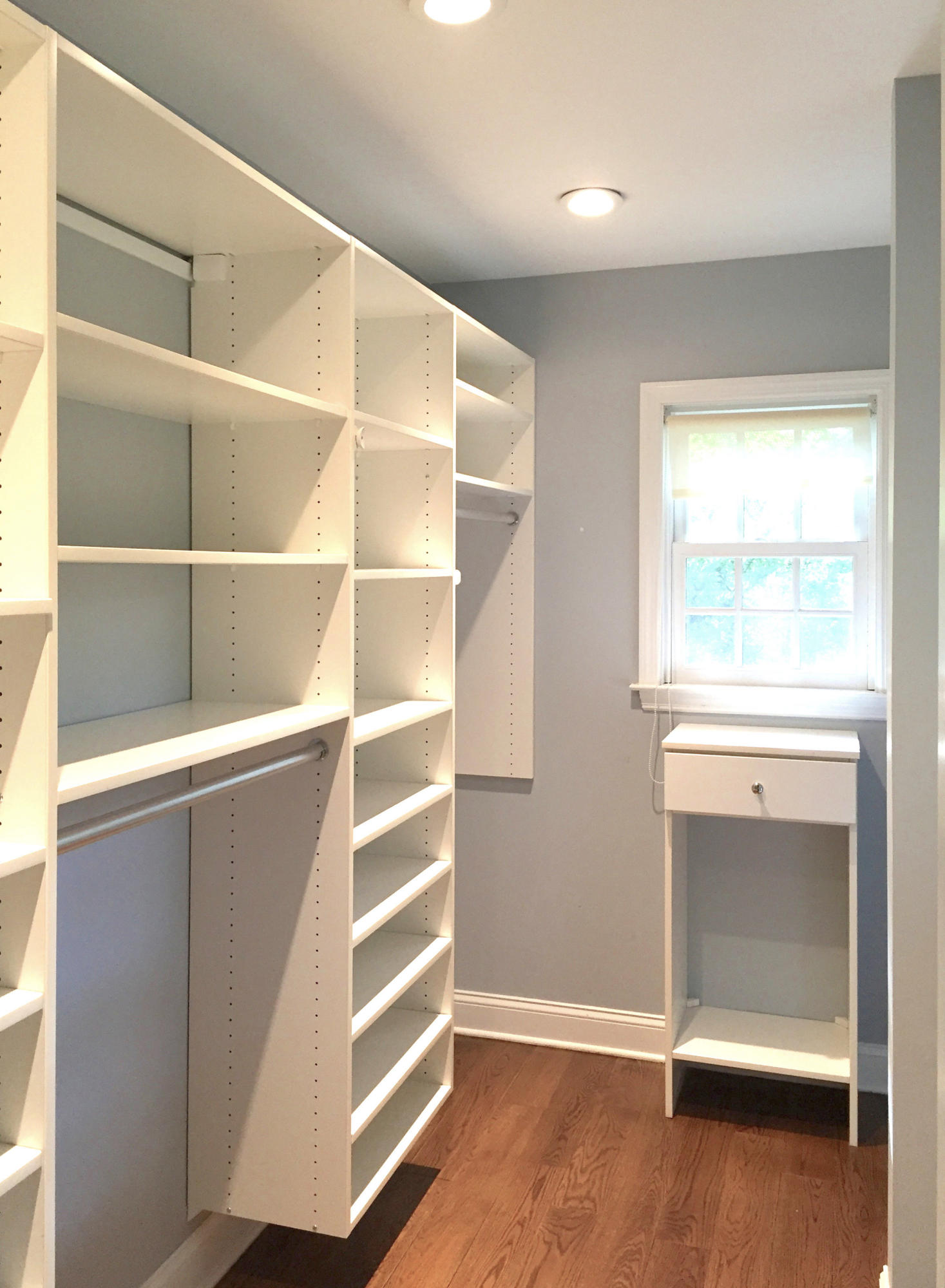 181 Middlesex Road Darien, CT 06820 - Photo 22 of 38 a view of an empty room with a window and wooden floor