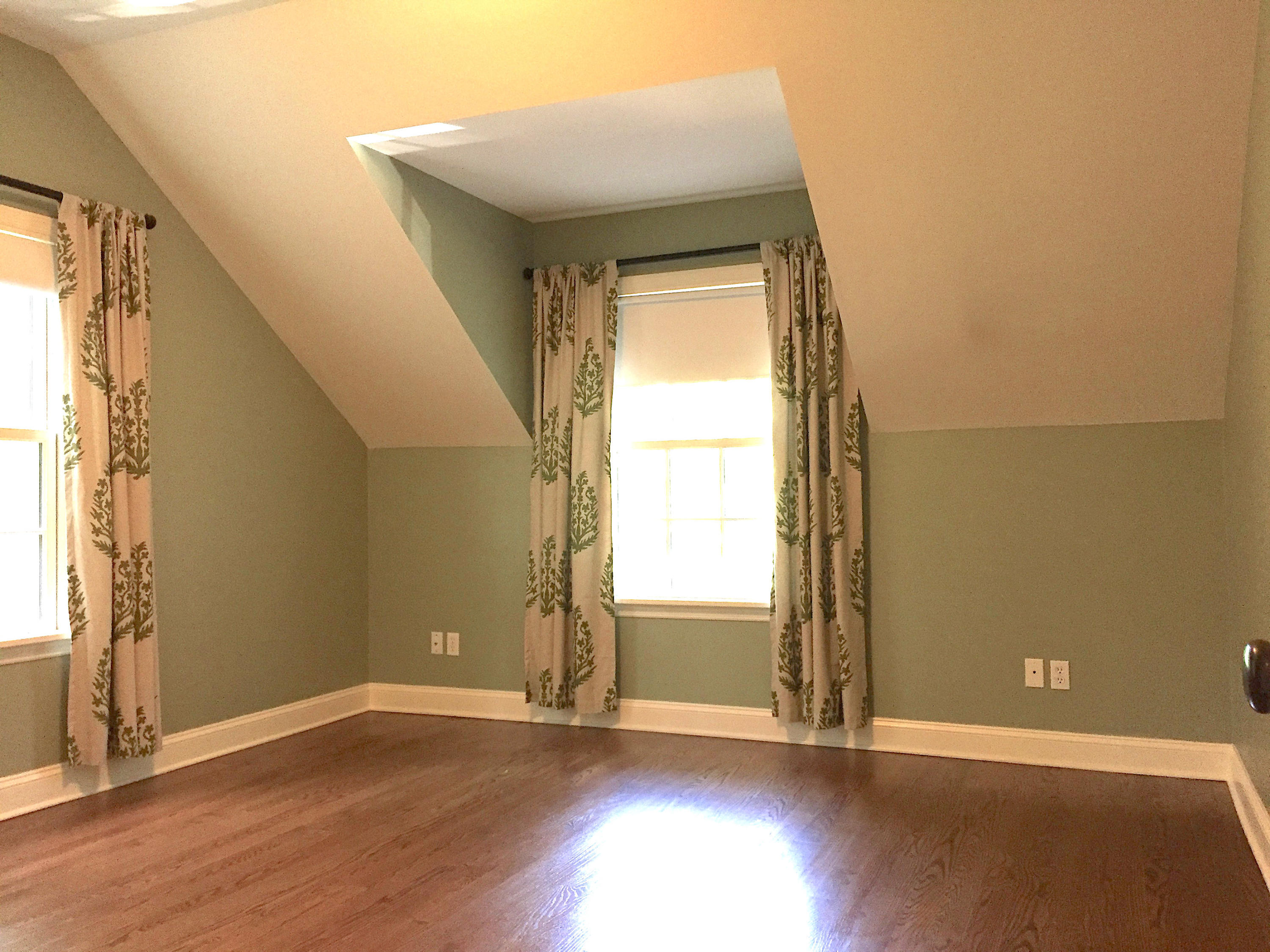 181 Middlesex Road Darien, CT 06820 - Photo 29 of 38 an empty room with wooden floor and windows