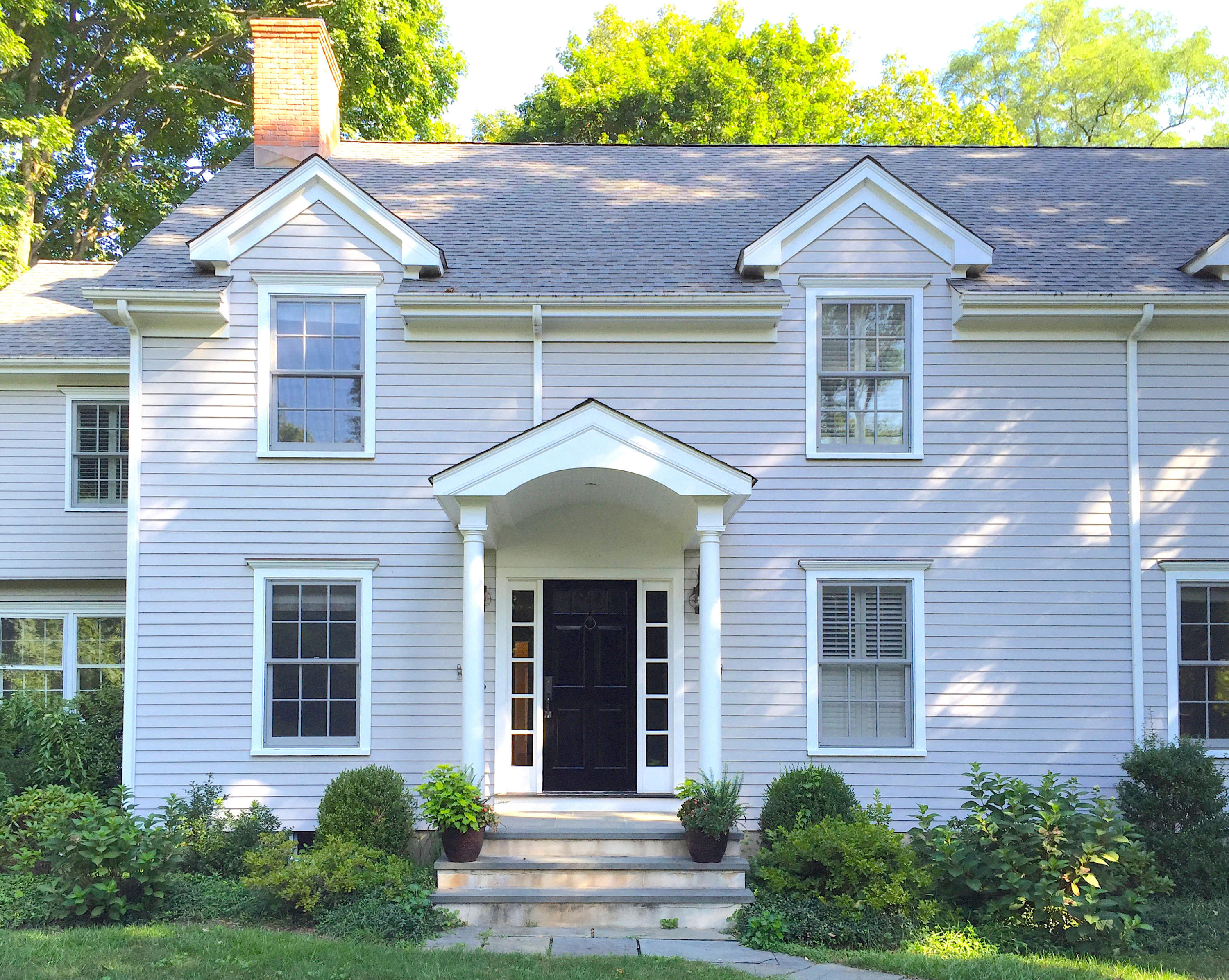 181 Middlesex Road Darien, CT 06820 - Photo 4 of 38 a front view of a house with garden