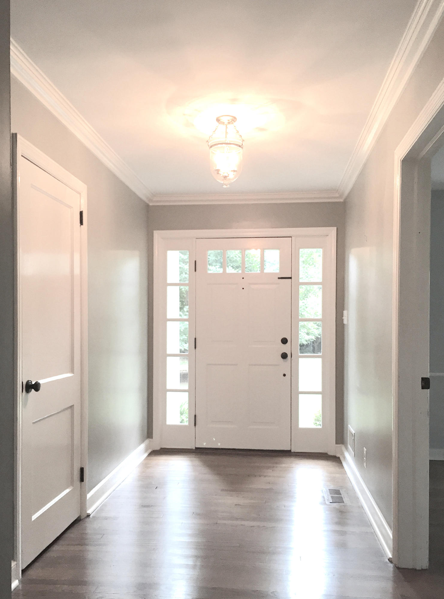 181 Middlesex Road Darien, CT 06820 - Photo 6 of 38 wooden floor in an empty room with a window