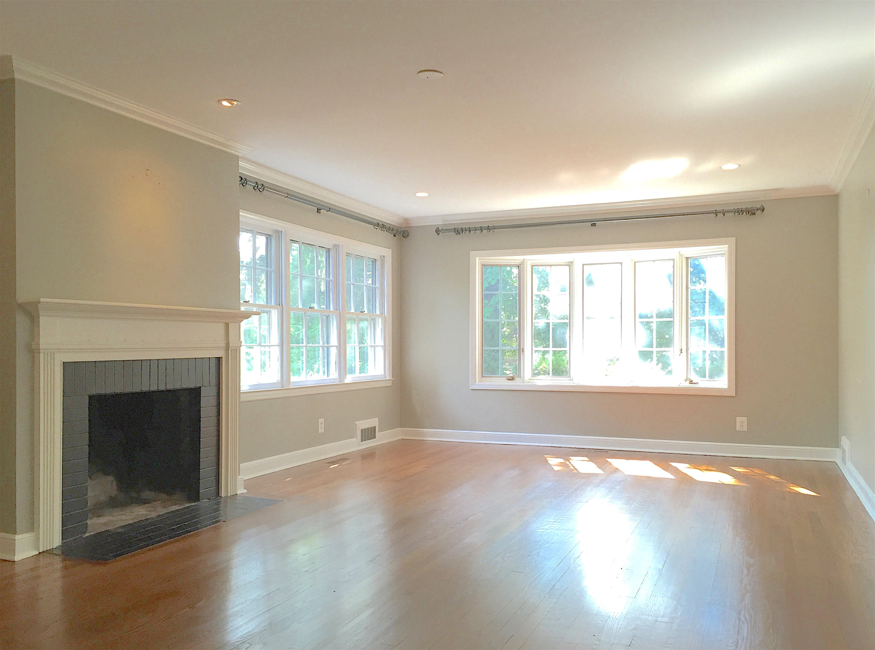 181 Middlesex Road Darien, CT 06820 - Photo 8 of 38 a view of an empty room with wooden floor and a window