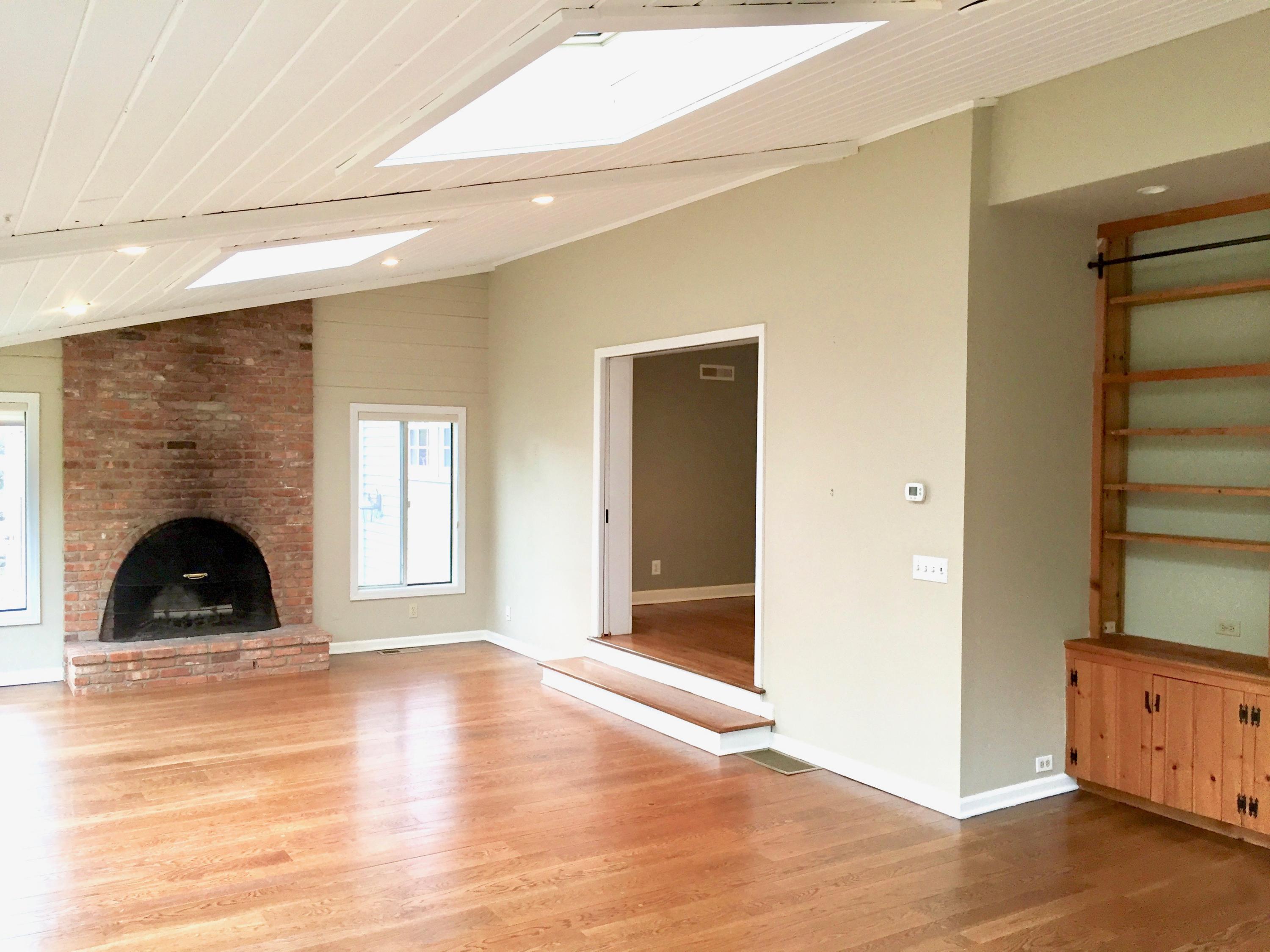 181 Middlesex Road Darien, CT 06820 - Photo 10 of 38 a view of a livingroom with a fireplace and window