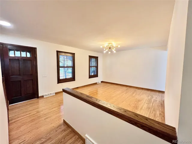 a view of an empty room and window