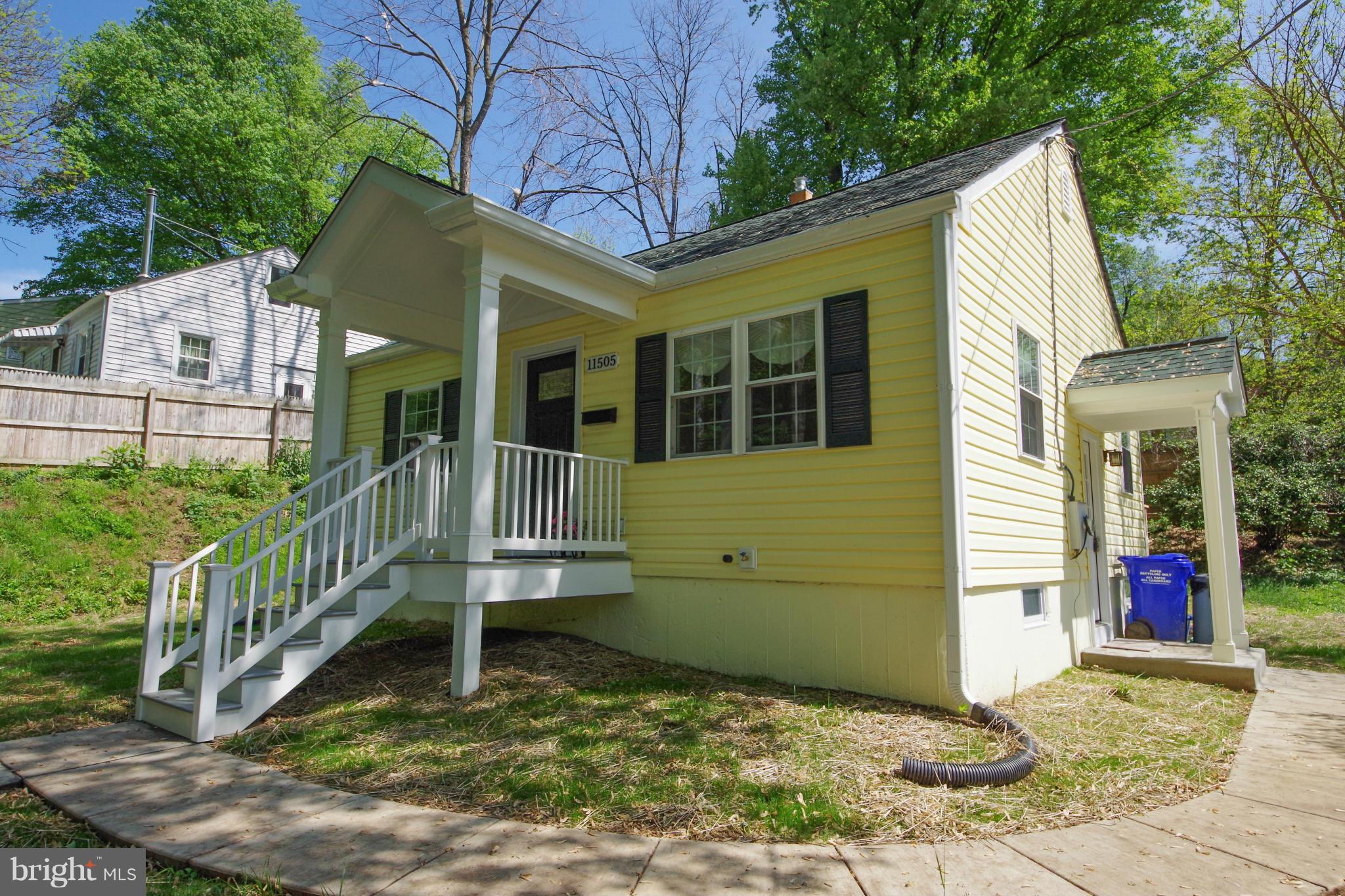 11505 Dewey Road Silver Spring, MD 20906 - Photo 3 of 29 a view of a house with a yard