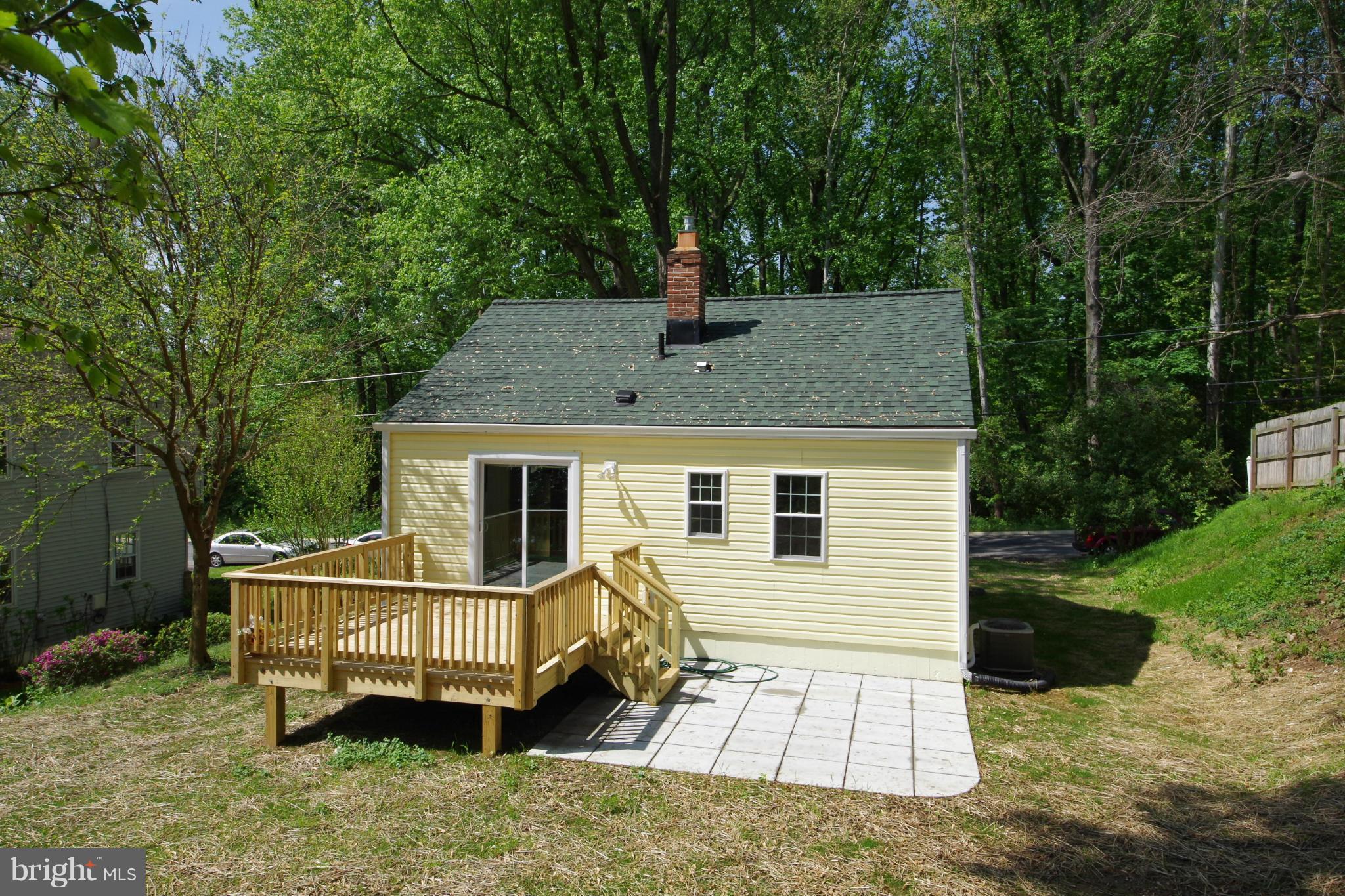 11505 Dewey Road Silver Spring, MD 20906 - Photo 5 of 29 a front view of a house with garden
