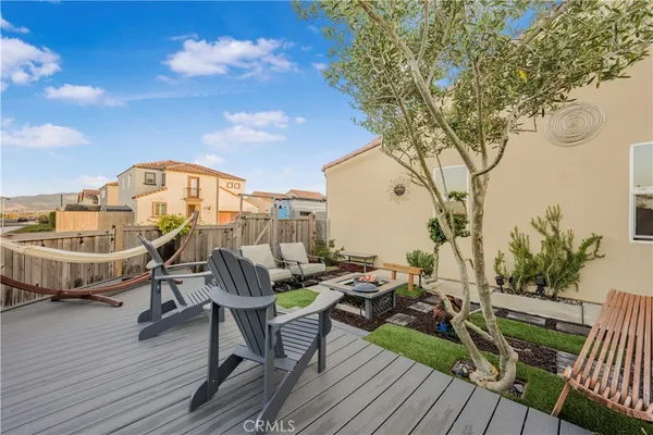 a view of a balcony with chairs