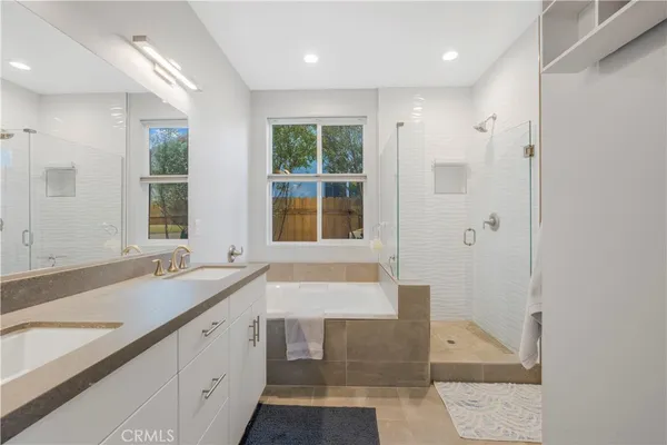 a bathroom with a sink and a bathtub