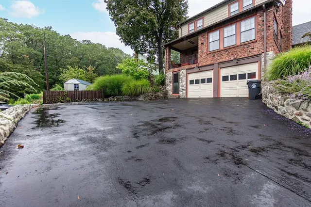 a view of a big building with large trees
