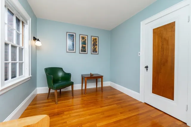 a view of a livingroom with table and chair