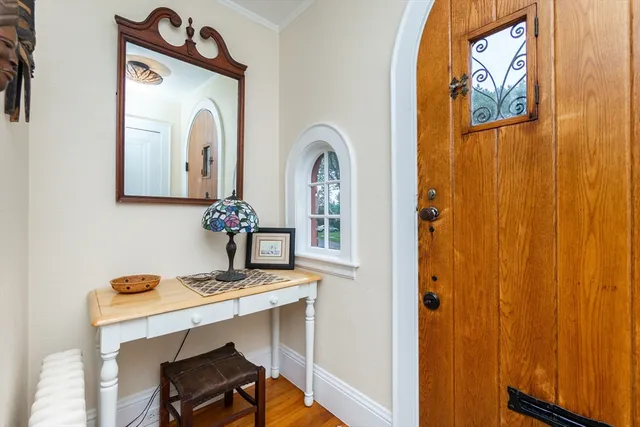 a view of a bathroom with a sink and a mirror