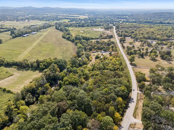 an aerial view of residential building and lake view