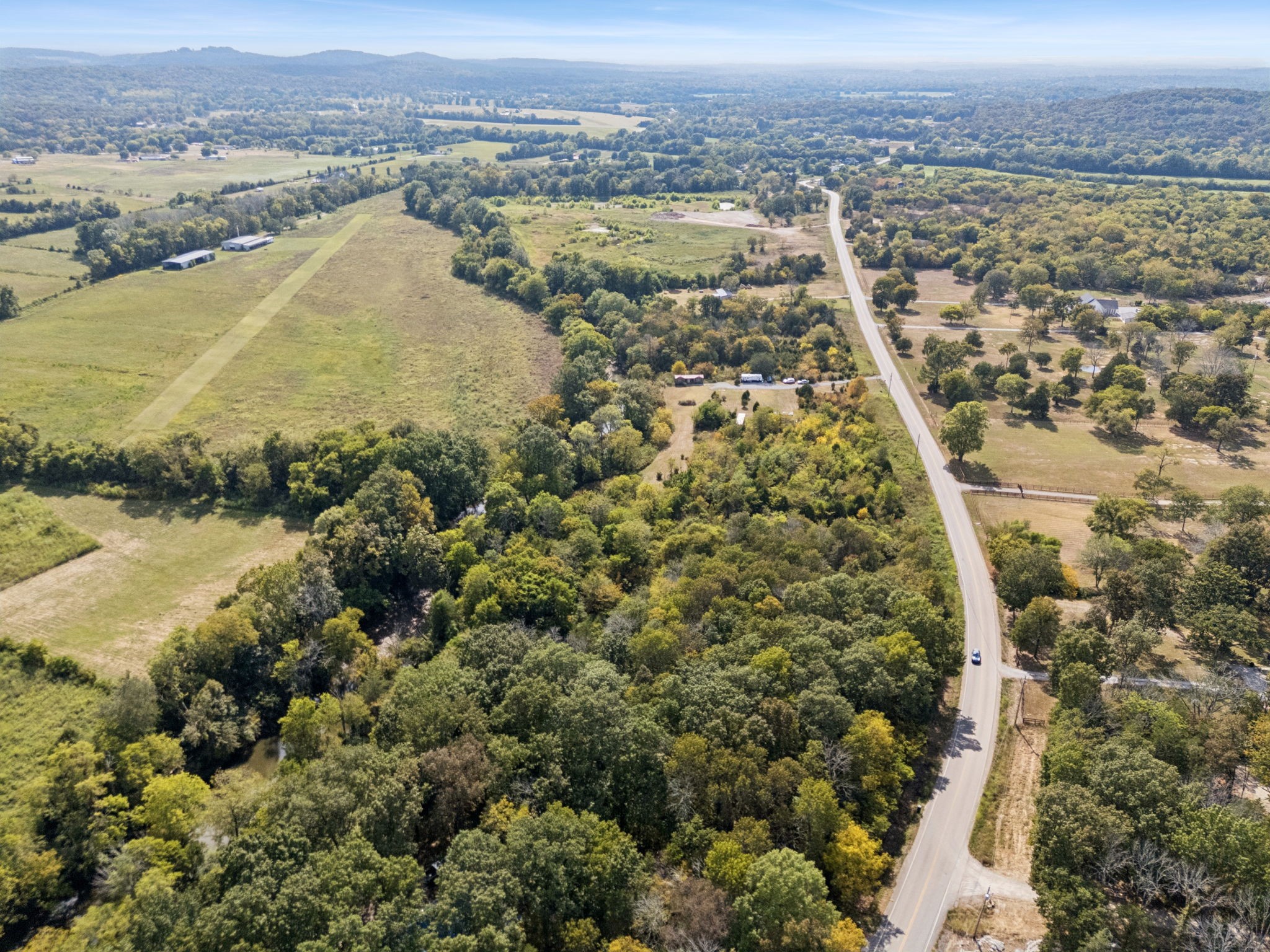 5252 Simmons Bluff Road Lebanon, TN 37090 - Photo 15 of 39 an aerial view of residential building and lake view