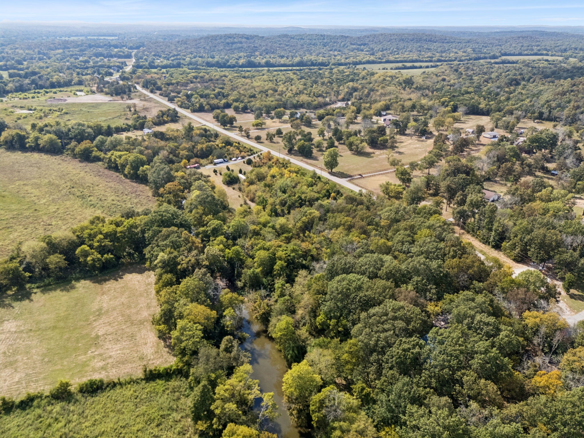 5252 Simmons Bluff Road Lebanon, TN 37090 - Photo 19 of 39 an aerial view of residential houses with outdoor space and trees