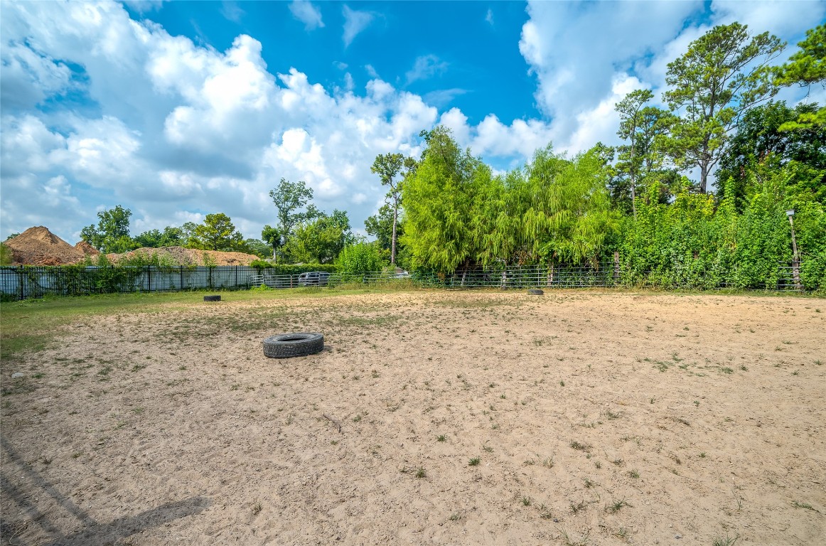 7302 Phillips Street Houston, TX 77088 - Photo 2 of 8 a backyard of a house with lots of green space