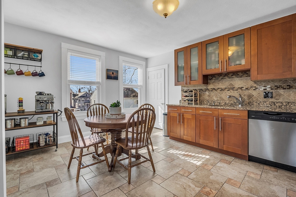 73 Orange Street, Unit 2 Waltham, MA 02453 - Photo 12 of 34 a dining room with furniture and window