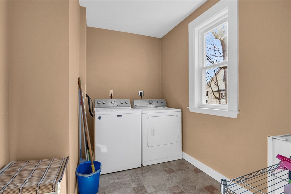 73 Orange Street, Unit 2 Waltham, MA 02453 - Photo 14 of 34 a utility room with dryer and washer
