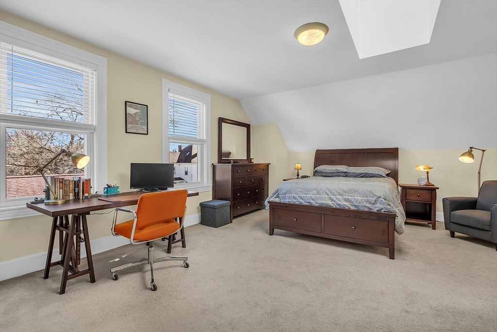 73 Orange Street, Unit 2 Waltham, MA 02453 - Photo 20 of 34 a bedroom with bed and a window