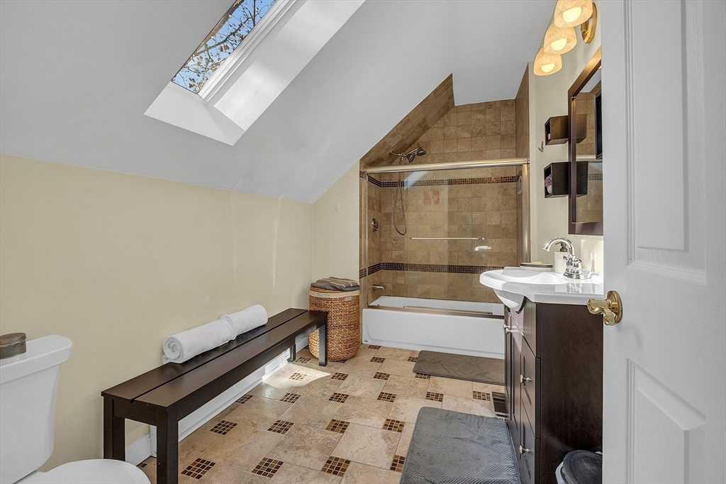 73 Orange Street, Unit 2 Waltham, MA 02453 - Photo 23 of 34 a bathroom with a sink toilet and shower