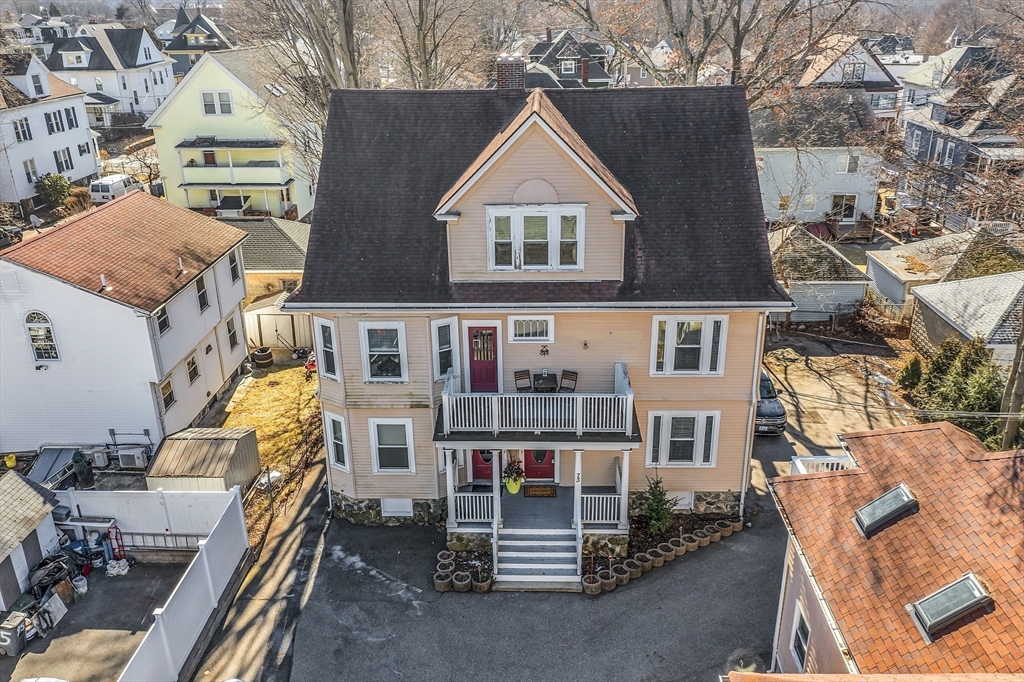 73 Orange Street, Unit 2 Waltham, MA 02453 - Photo 28 of 34 an aerial view of multiple houses