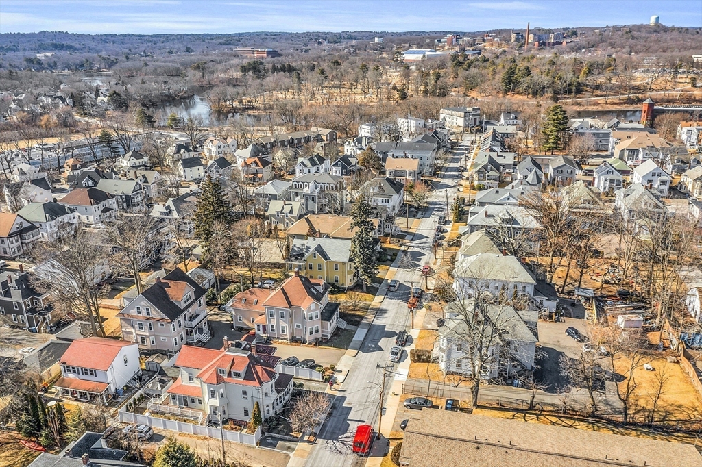 73 Orange Street, Unit 2 Waltham, MA 02453 - Photo 30 of 34 an aerial view of residential houses with outdoor space