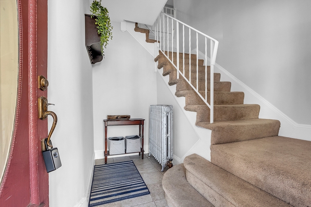 73 Orange Street, Unit 2 Waltham, MA 02453 - Photo 3 of 34 a view of entryway and hall