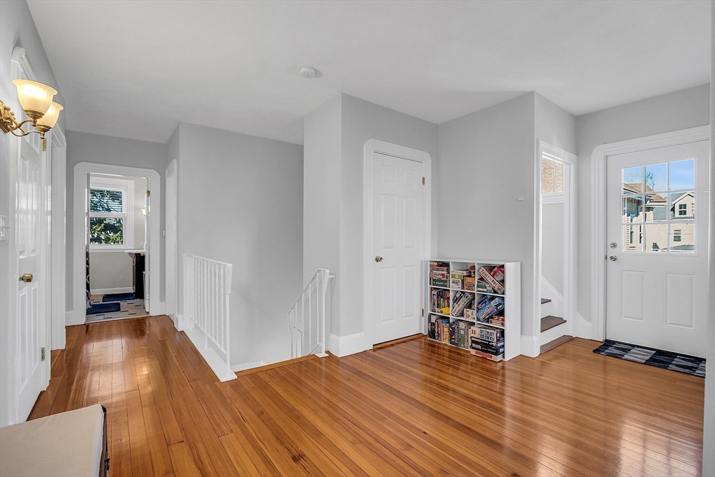 73 Orange Street, Unit 2 Waltham, MA 02453 - Photo 5 of 34 workspace with wooden floor and closet