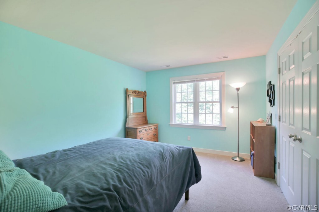 15311 River Road Chesterfield, VA 23838 - Photo 16 of 19 a bedroom with a bed and window
