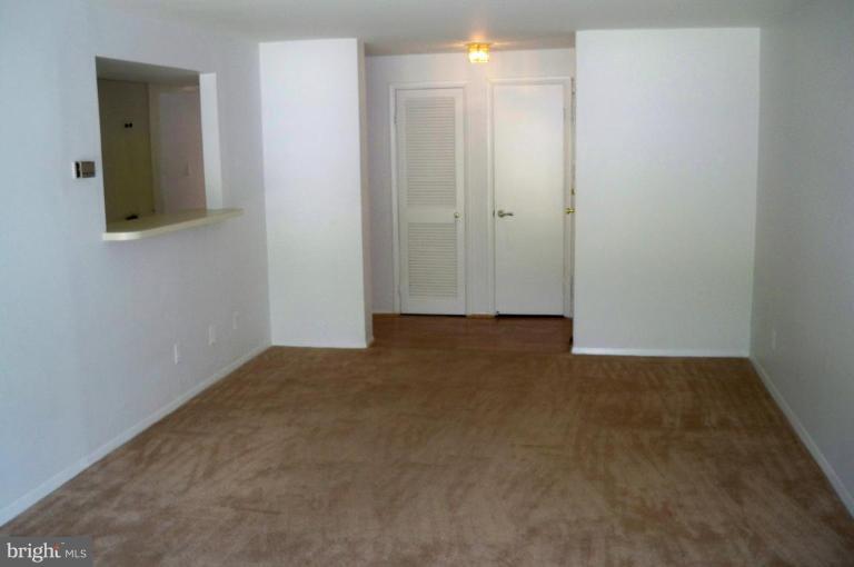 19116 Mills Choice Road, Unit 4 Montgomery Village, MD 20886 - Photo 9 of 14 Living Room/Dining Room