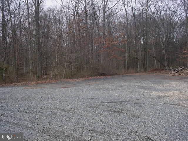 1 Rock Hill Road Sterling, VA 20166 - Photo 3 of 11 a view of a backyard of the house