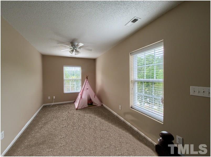 2647 Quarry Ridge Lane Raleigh, NC 27610 - Photo 13 of 18 a room with air conditioner and a window