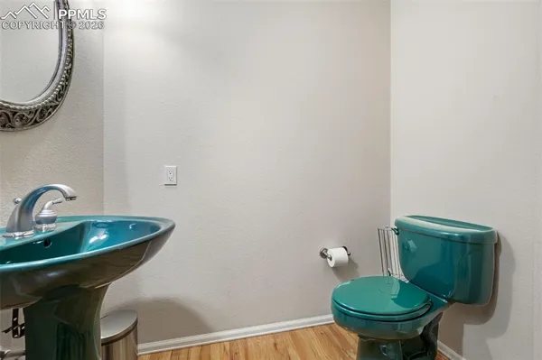 a bathroom with a toilet and a sink