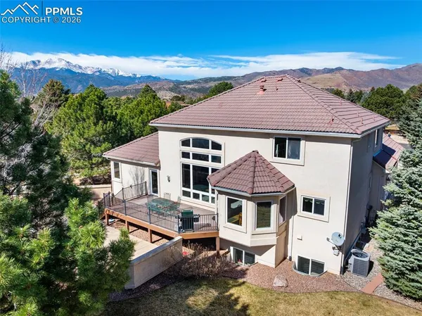 a aerial view of a house with a yard