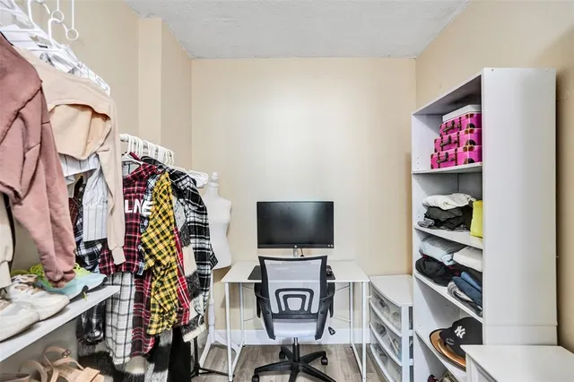 a view of a livingroom with furniture and toys