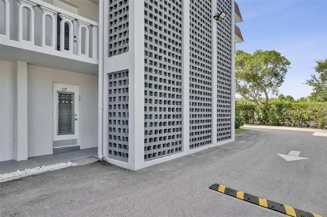 a garden with trees in the background