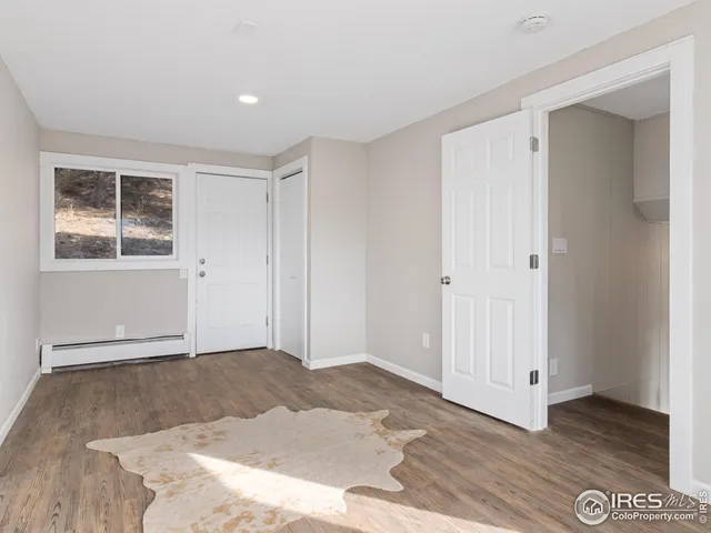 a view of a chairs and table in a livingroom