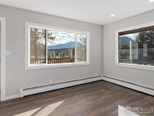 a room with a bed and a window