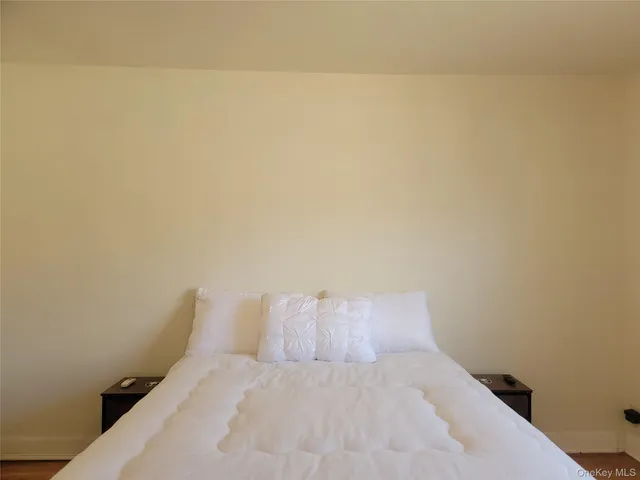 a bedroom with a bed