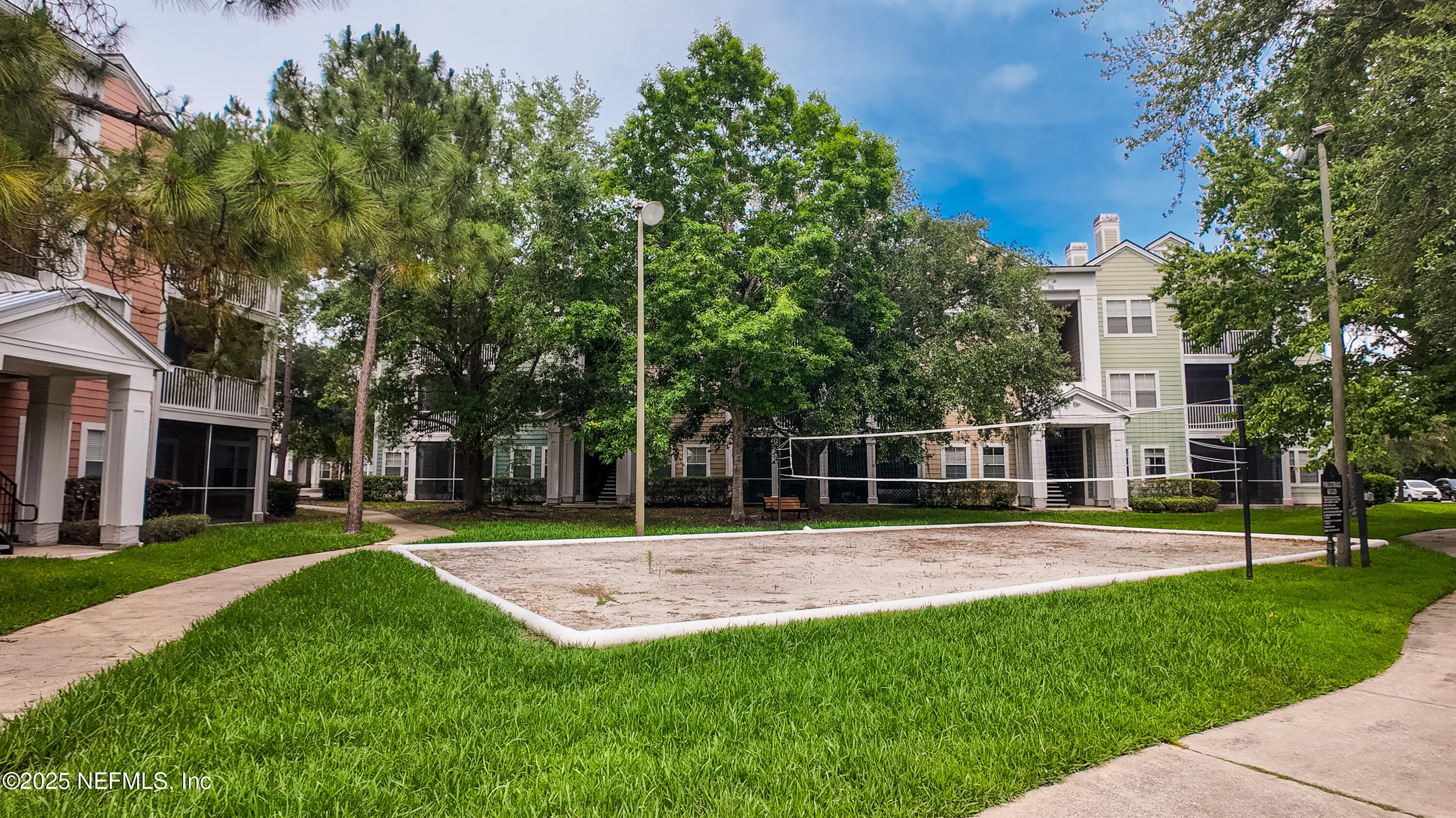 8550 Touchton Road, Unit 428 Jacksonville, FL 32216 - Photo 22 of 26 a view of a house with a backyard