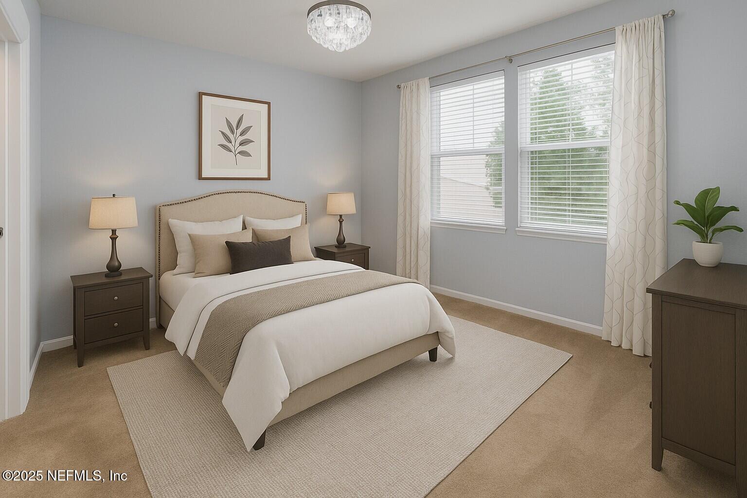 8550 Touchton Road, Unit 428 Jacksonville, FL 32216 - Photo 8 of 26 a bedroom with a bed and a painting on the wall