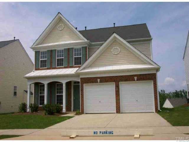 7435 Lagrange Drive Raleigh, NC 27613 - Photo 1 of 1 a front view of a house with garden