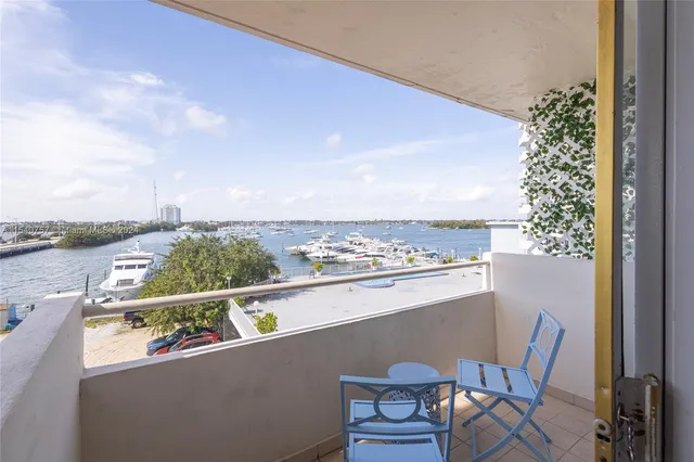 a view of a balcony with an ocean view