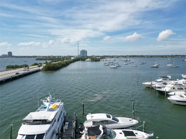 a view of a lake with patio