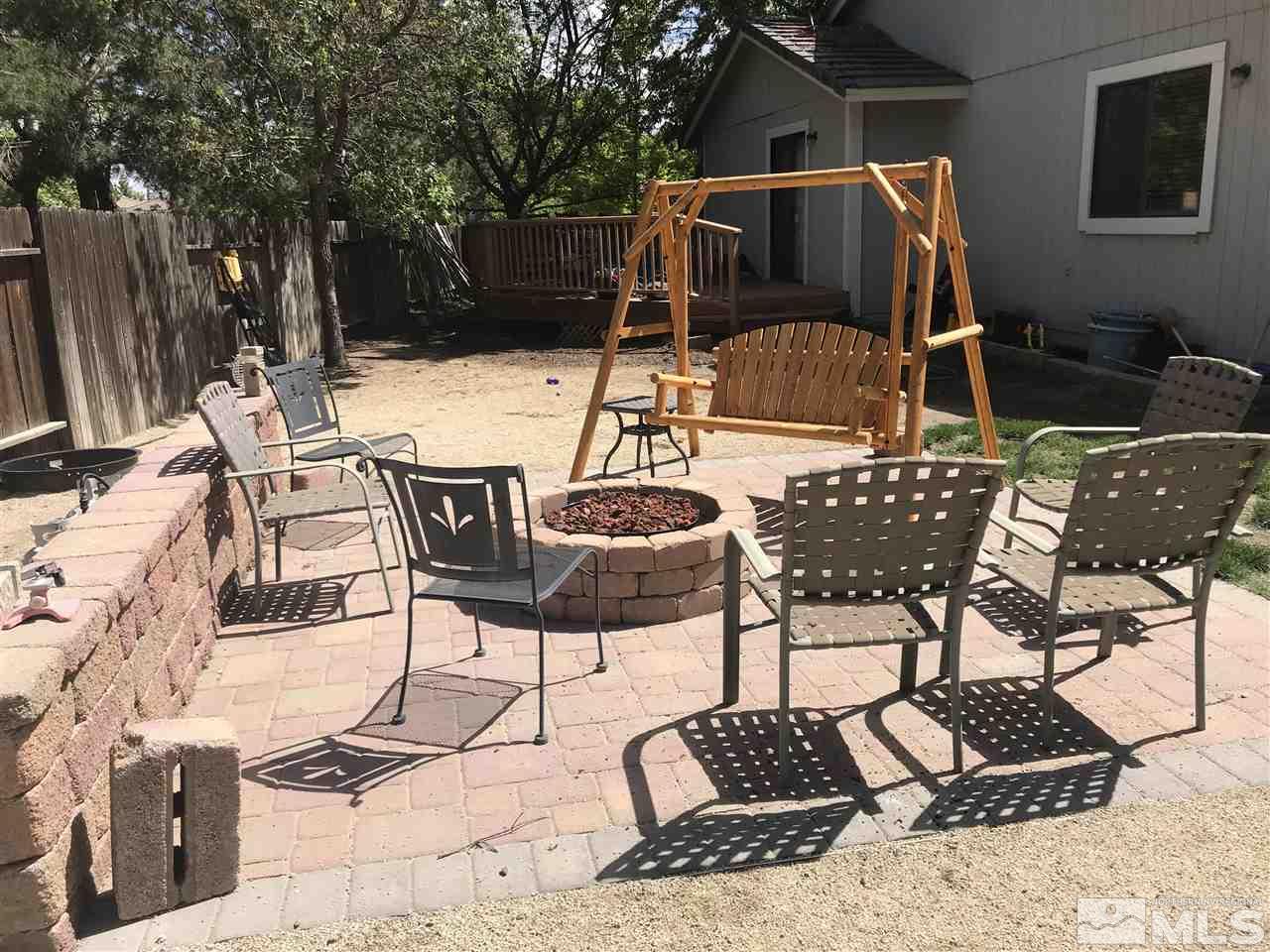 2254 Escalera Way Reno, NV 89523 - Photo 5 of 7 a patio with table and chairs