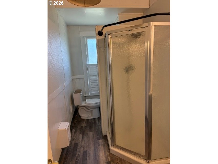 1914 Southeast Court Avenue Pendleton, OR 97801 - Photo 15 of 28 a bathroom with a glass shower door