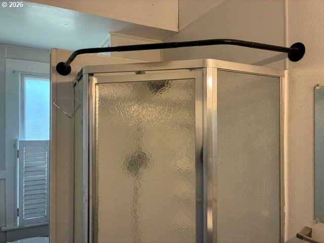 1914 Southeast Court Avenue Pendleton, OR 97801 - Photo 16 of 28 a bathroom with a glass door shower