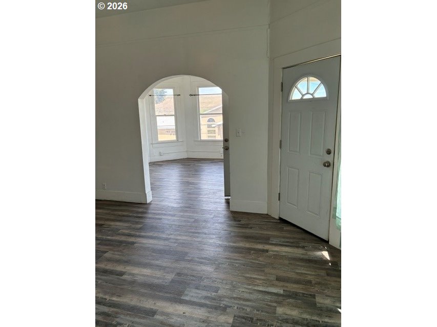 1914 Southeast Court Avenue Pendleton, OR 97801 - Photo 4 of 28 a view of a hallway with wooden floor