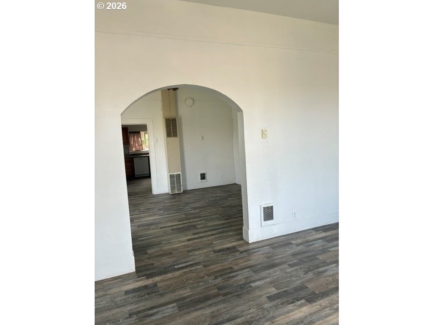 1914 Southeast Court Avenue Pendleton, OR 97801 - Photo 5 of 28 a view of a hallway with wooden floor